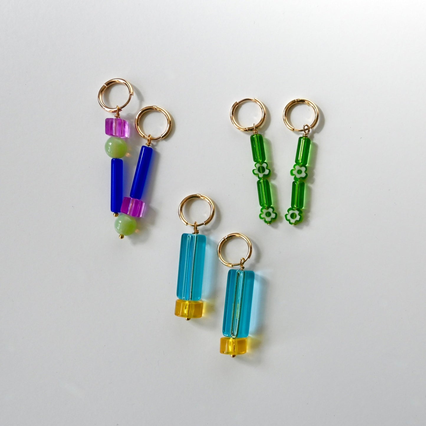 Colorful Beaded Huggie Hoops - Shape & Color colorful goods made in the USA