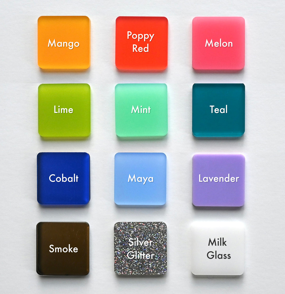 Grid of 12 square acrylic swatches showing available earring colors, each labeled. Top row: Mango (orange), Poppy Red, Melon (pink). Second row: Lime, Mint, Teal. Third row: Cobalt (deep blue), Maya (light blue), Lavender. Bottom row: Smoke (translucent brown), Silver Glitter, Milk Glass (frosted white). Most have a soft frosted finish.